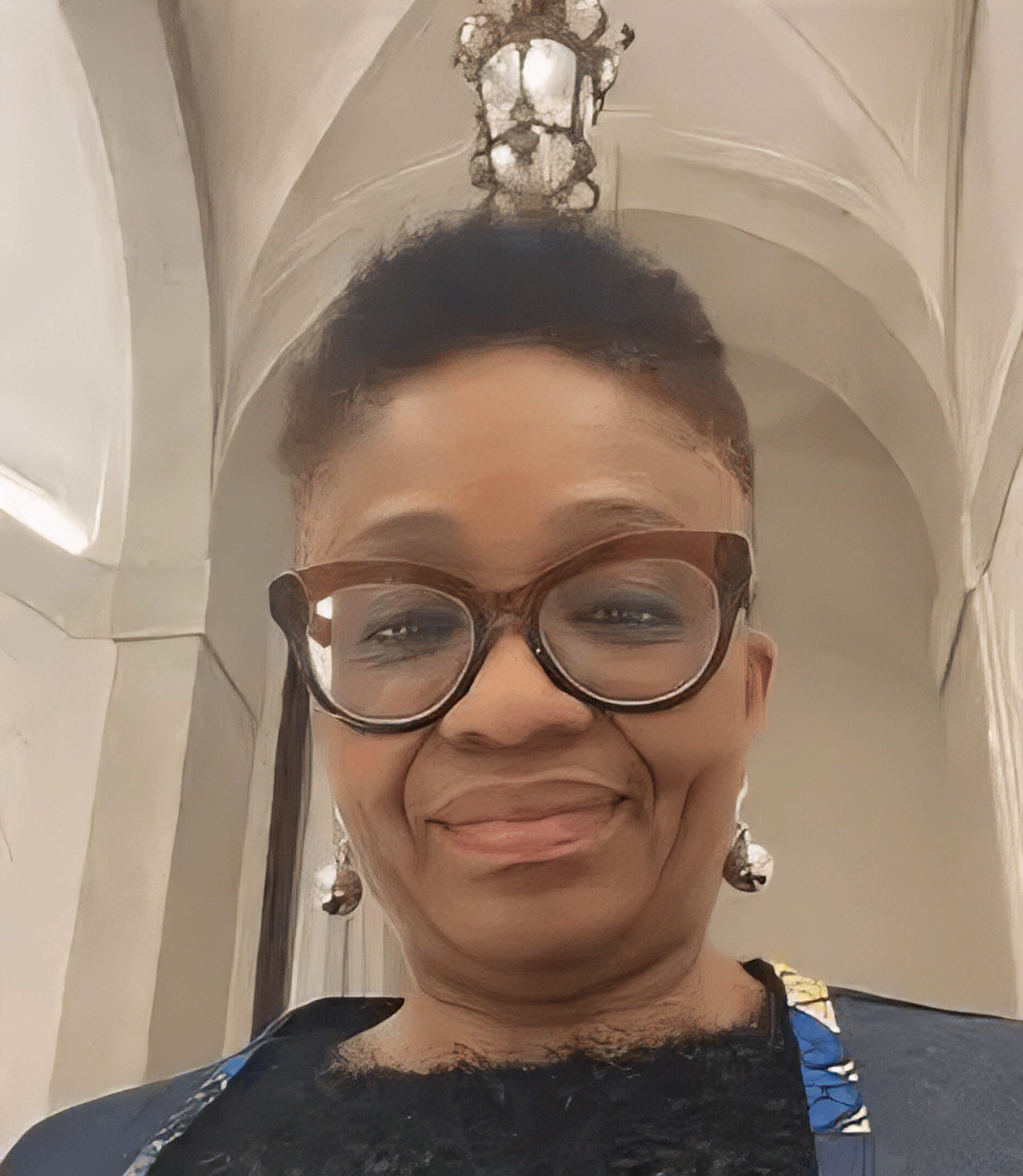 Essie Rewane — Founder & Director